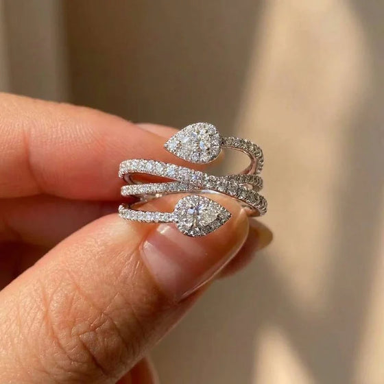 Anillo de cruz con circonitas